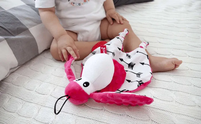 Mom´s Care Mazlící hračka s kousátkem - Sheepi růžová