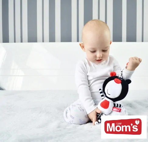 Mom´s Care Závěsný medvídek Buuu s ukolébavkou